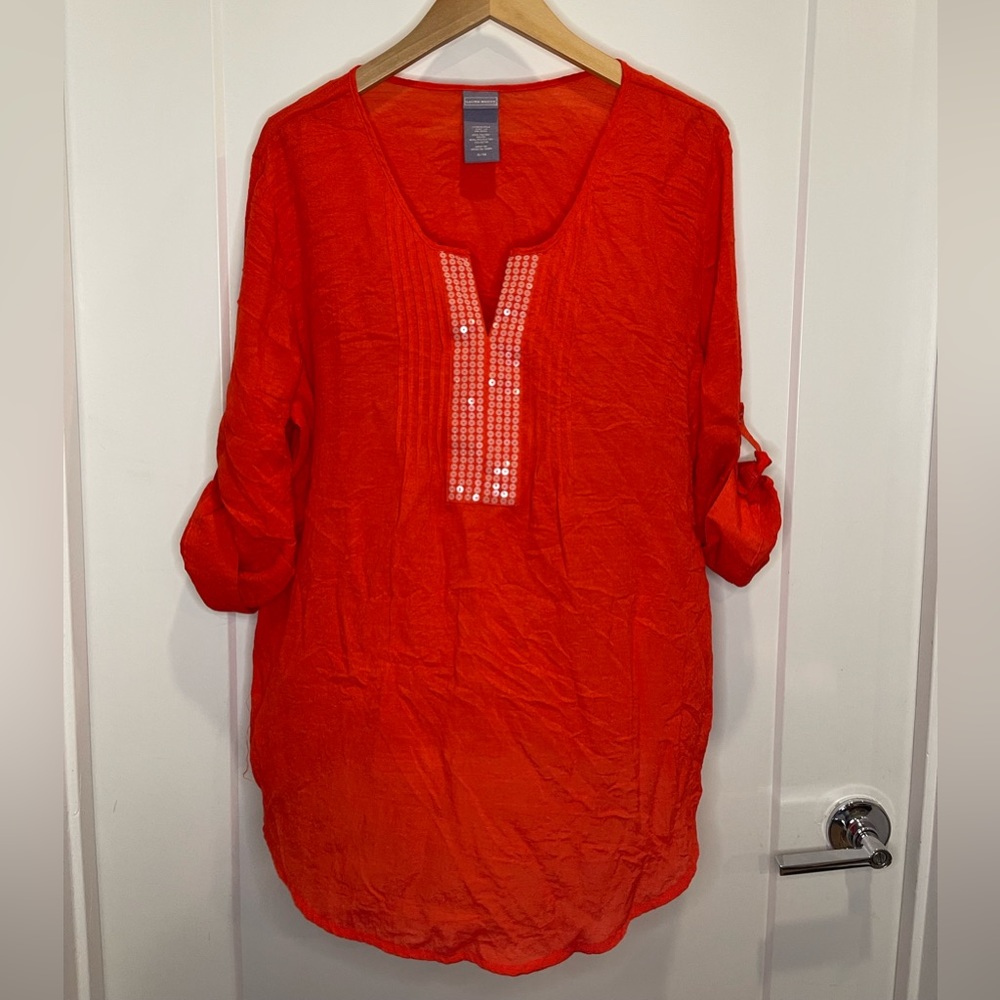 Woman’s XL red long sleeved tunic with sequin detail.